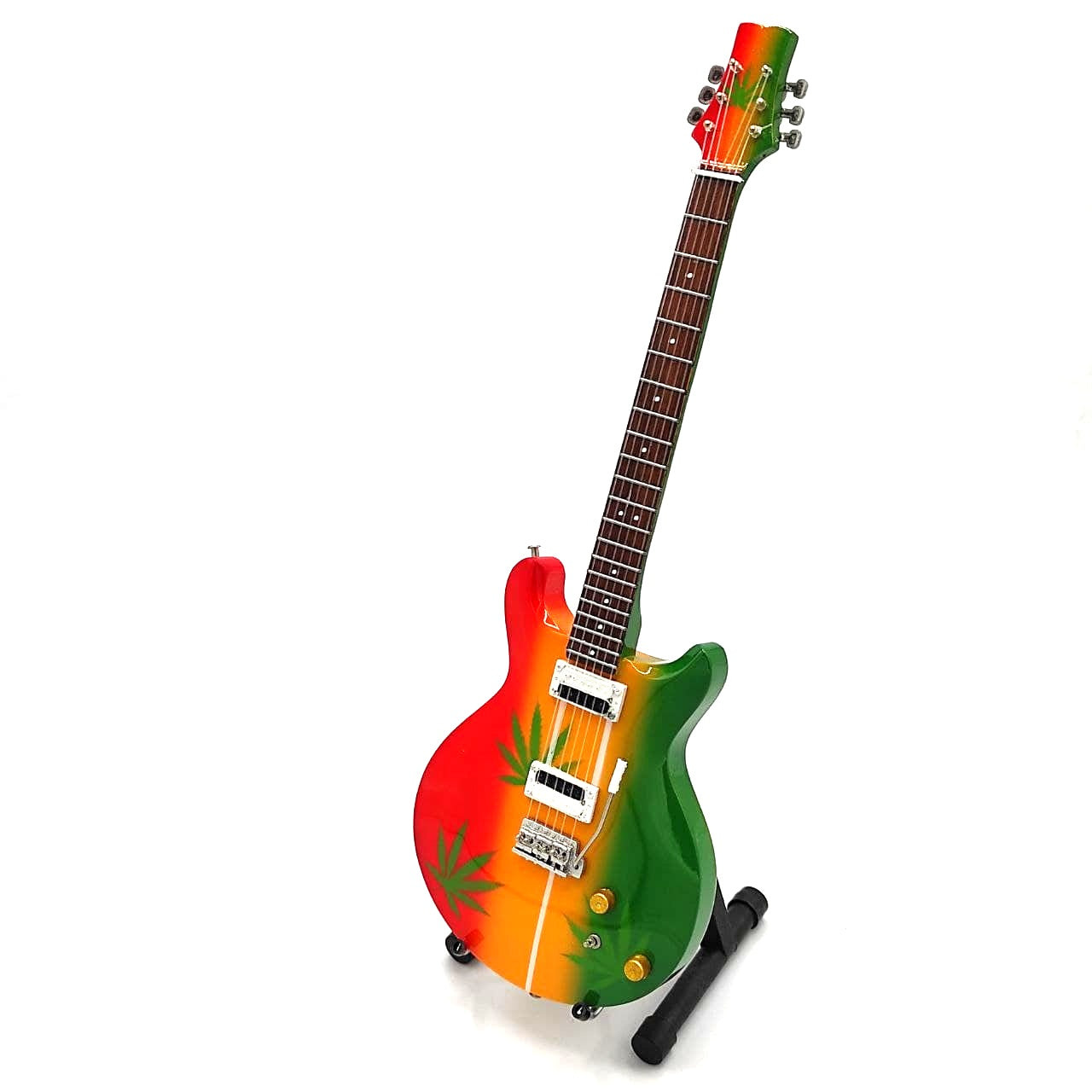 Mini chitară Bob Marley Tribute Ganja MGT-0468 cu posibilitate de personalizare prin gravură, cadou ideal pentru fanii reggae, realizată manual din lemn de mahon, înălțime 27,5 cm, culoare galben, roșu, verde, alb