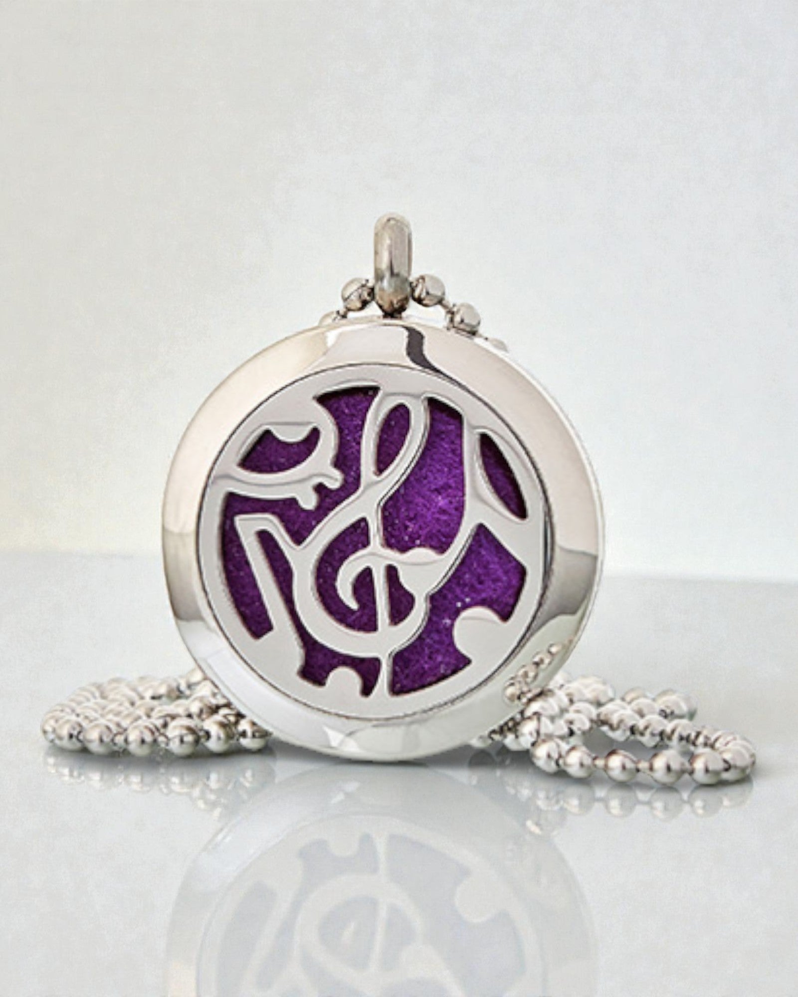 Simfonia miresmei – Colier terapeutic cu aromă, cu motiv de note muzicale 25 mm