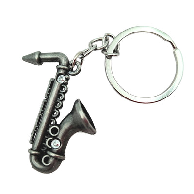 Breloc metalic saxofon de culoare argintie