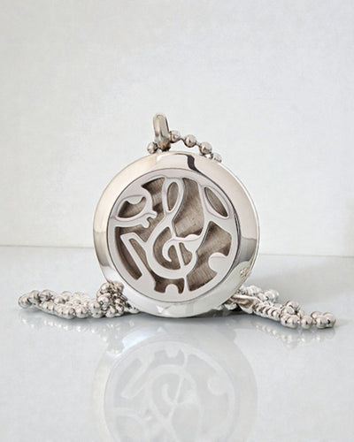 Simfonia miresmei – Colier terapeutic cu aromă, cu motiv de note muzicale 25 mm