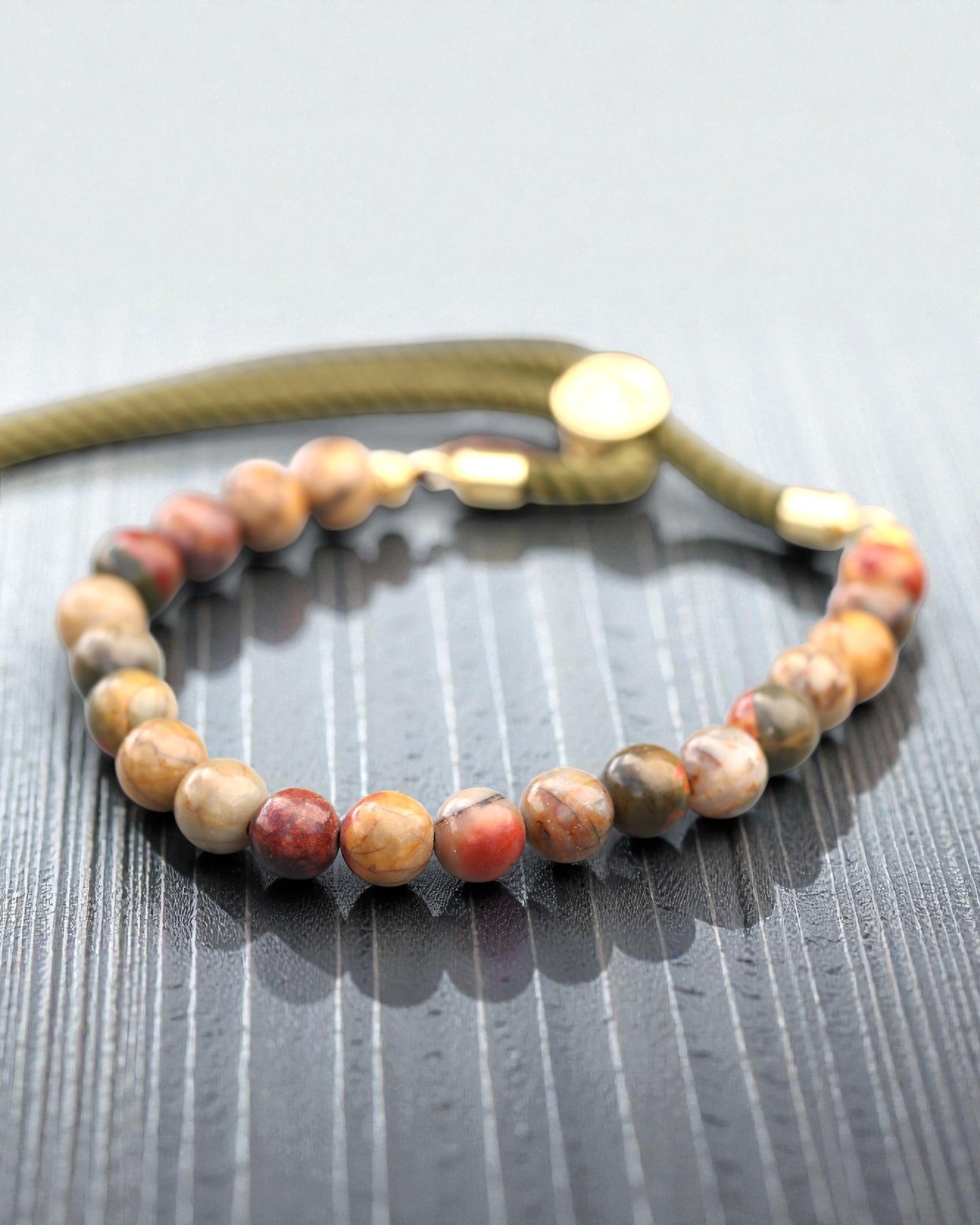 Moss Aura – Brățară cu jasp Picasso și aur de 18K pe șnur verde