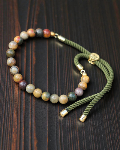 Moss Aura – Brățară cu jasp Picasso și aur de 18K pe șnur verde